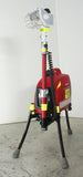 LENTRY Light System model 1OPUPS consisting of a 1000 watt generator, standard height pole, and a 750 watt light. The three independently adjustable legs and telescoping pole are fully extended with the light head aiming slighting to the side.