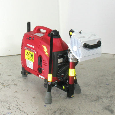 LENTRY Light System model 1OPUPS with a 1000 watt generator and 750 watt light. The three independently adjustable legs and telescoping pole are fully retracted, with the light head folded forward, allowing this system to be ready for transport or storage.