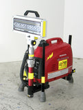 V-Spec LED LENTRY model 1SPECS with a 1000 watt generator, standard height pole, and V-Spec LED. The three independently adjustable legs and telescoping pole are fully retracted with the light head tilted up and facing forward.