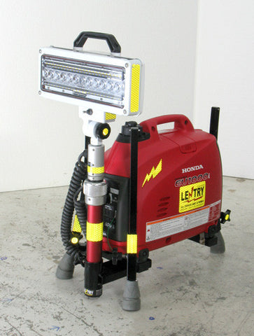 V-Spec LED LENTRY model 1SPECS with a 1000 watt generator, standard height pole, and V-Spec LED. The three independently adjustable legs and telescoping pole are fully retracted with the light head tilted up and facing forward.