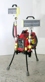 LENTRY portable light system model 1SPECSS consists of a 1000 watt generator, two standard height poles, and two V-Spec LEDs (each offering 28,000 lumens for 56,000 total lumens). The three independently adjustable legs are fully extended, while one telescoping pole is fully extended and the other pole is fully retracted. Each light head is aimed to the side, in opposite directions.