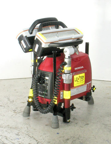 Dual V-Star LED portable LENTRY Light System Model 1STARSS shown with the all-terrain legs and telescoping poles fully retracted and the light heads folded back over the top of the generator for storage.