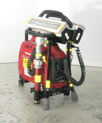 Dual V-Star LED portable LENTRY Light System Model 1STARSS shown with the three independently adjustable legs and telescoping poles fully retracted and both light heads folded back over the top of the generator.