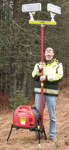 James shown extending the 2-Headed LED light head on Lentry LIghting System Model 2TWSPX-C34. The all-terrain legs are shown at different lengths in order to keep the generator level. Case not shown.
