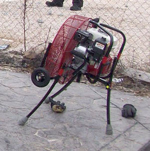 VENTRY 20-inch Fan Model 20GX120 in use at a fire department training. Fan is shown with optional Medium Flat-Free Wheels & Skids and the two front legs fully extended, while the rear leg is partially extended, allowing the fan to be aimed up.