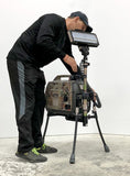 Portable Camo Lentry Light Model 2SPECX+S-C23-CMO with standard height pole installed next to 6-foot man. Not shown: XT height pole and Case.