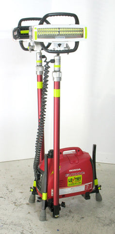 Dual LENTRY V-Star LED portable lighting system model 1STARXX, shown with the all-terrain legs and telescoping poles fully retracted and light heads facing away from each other