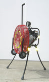 Side view of all-terrain Ventry Fan Model 24GX160 shown with optional Entry Point LED, Medium Flat-Free Wheels & Skids, and Misting Kit. The verticle tow handle is shown fully extended up from the center of the fan while the three independently adjustable legs are also shown fullyl extended.