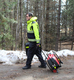 James is shown transporting Lentry Lighting System Model 2SPECS-C23 with the Wheels & Handle Kit on compact dirt. The V-Spec LED and standard height pole are stored inside the case.