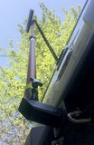 View from underneath Lentry Lighting System's Receiver Hitch Pole Mount, shown with an extra tall LED and attached to a truck's trailor hitch