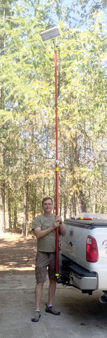 LENTRY Receiver Hitch Pole Mount works with any height of Lentry Lighting System's telescoping poles. Shown here with a Hi-Lite height LED next to James, who stands over 6-feet tall.